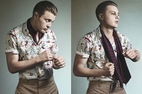 Prada’s SS12 campaign takes Boardwalk Empire’s star Michael Pitt and pairs him with strong, playful colorful prints for the upcoming season, all inspired by a 50’s era ambience. Especially loving the silk patterned neck scarves…