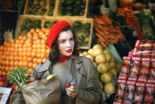 theniftyfifties:Girl at a fruit stall in New York City, 1950s. Photo by Ruth Orkin.