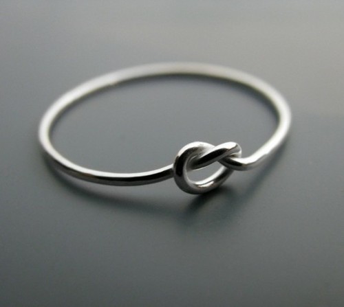  A “knot” ring. The ring symbolizes a knot that is not quite tied yet, but has