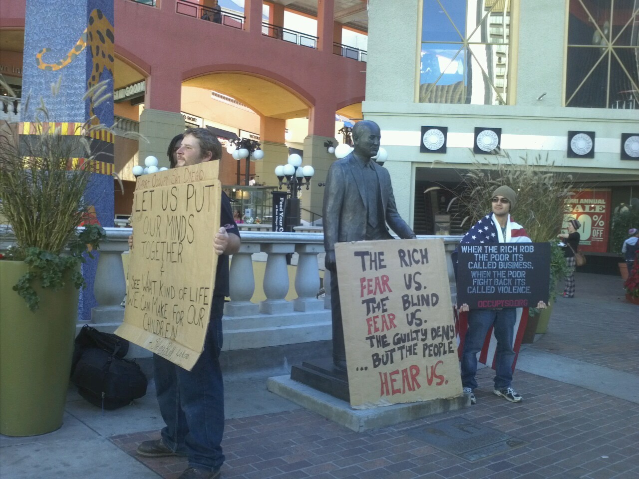 jennieisdelicious:
“Lunch hour activism with #occupySD @ Horton plaza
”
Occupy San Diego take it to Horton Plaza mall on December 29 for some lunch-hour activism.