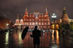 suspiration:  Red Square, Moscow, Russia Photograph by Erich Geisler, My Shot On a rainy night in Red Square a man photographs the scene with his camera phone. 