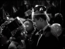  Carole Lombard and Jimmy Stewart kiss on New Year’s Eve at Midnight in Made For Each Other (1939) 