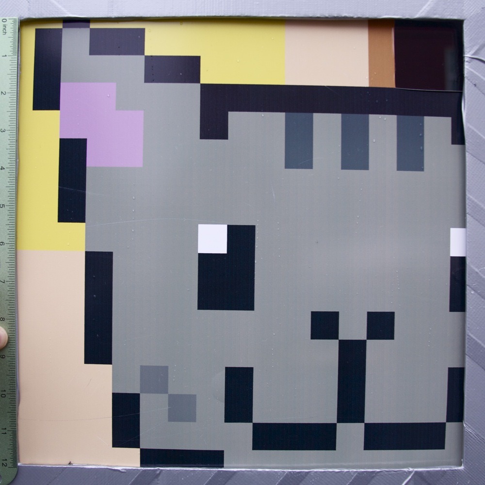Diptych 2 of 2, Nyan Cat window sticker, NE Alberta St.