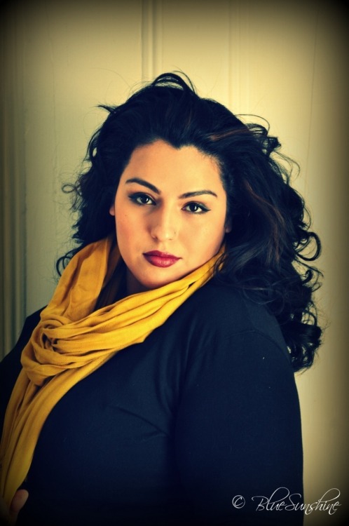 One of my models in my is currently featured on PlusModel411.com, her name is Andreina (also known a