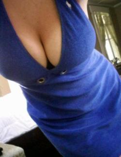 the top of her dress is nice cleavage looking out lush tits,mmmmm,x