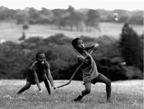 beneaththepool:South African kids playing cricket outside of Buffalo Park. <3Getty/Shaun Botteril