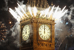 LONDON, ENGLAND - JANUARY 01: Fireworks light up the London skyline and Big Ben just after midnight 