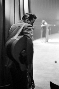 rootsnbluesfestival:  johnny cash prepares to take the stage at a show in white plains, ny, 1959. 