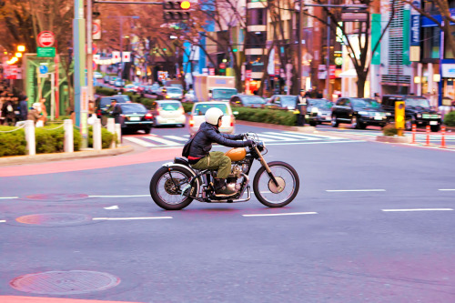 Cool motorcycle riding through the intersection of Meiji Dori &amp; Omotesando Dori in Harajuku.