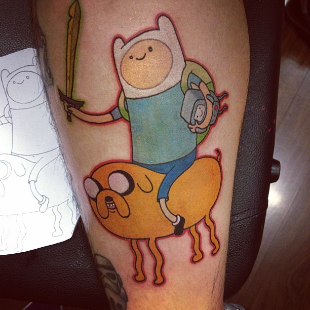 fuckyeahtattoos:  My Adventure Time tattoo! Done by ryry @ Seventh Circle, Brisbane.