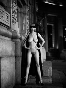 vlaroche:  Here I am in Chinatown at the foot of the Manhattan Bridge, standing on cobblestones on 8-inch heels, blindfolded like a tramp sacrifice. Shot by Richard Warren and his awesome team, June 2011. Happy 12th Night! Carnival begins today for New