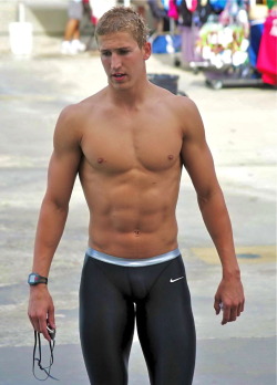 jockbrad:  Swimmers, wrestlers, football players / singlets, jockstraps, speedos and spandex!http://jockbrad.tumblr.com/