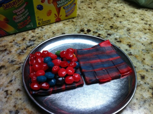 dekutree:  bace-jeleren:  wasifio:  Gushers sandwich with Fruit by the Foot as bread.  This is it. This is what I became an adult for. To be able to go down to the grocery store, buy a box of fruit by the foot and a box of gushers and make this and not