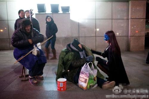 occupyallstreets:Female superhero Chinese Redbud Woman appears in Beijing This May, a female “superh