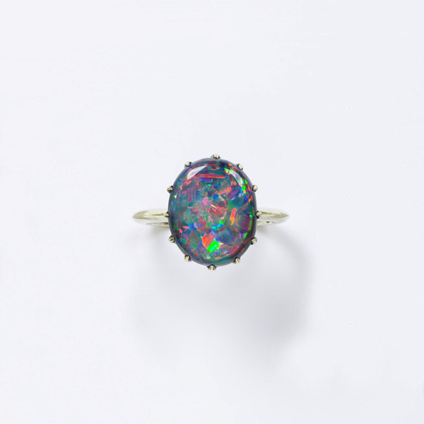  Ring. 1850-1913. Radiant and rare Black Opal embedded and mounted on gold.  