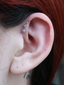 safepiercing:  Triple helix piercing done by Dustin at Shaman’s Den Body Arts in Binghamton, NY. Jewelry from Neometal 