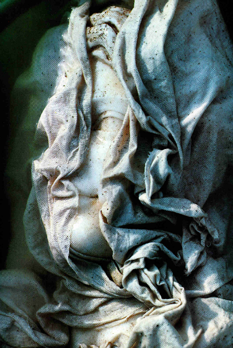 cratered:  Veiled to uncover her beauty, the head of a second-century A.D. Aphrodite soaks in water to loosen encrustations and to leach damaging impurities that have penetrated the marble 