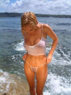 wettshirtbabes:  OMG … hourglass blonde gets her top and panties wet …  Transparent Panties