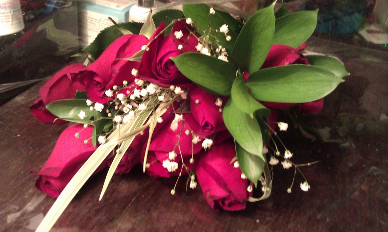 abraham is so adorable. he gave me these lovely roses to walk around with all day,