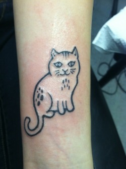 fuckyeahtattoos:  My cattoo a couple minutes after it was finished. I got my cat on my wrist to keep me grounded, I have had cats my whole childhood so it reflects my past and I want to be a vet so it also reflects my future. I got it done by Kyle Messina