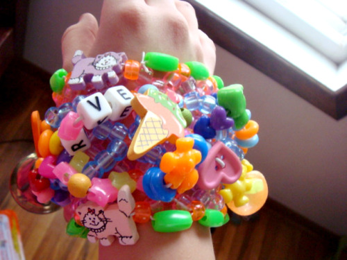 littlekandilola:  Kandi Kid Challenge!  Day 2: Something kandi related that was given to you/traded! I just picked my most ridiculous kandi. : 3 This was given to me by my friend Kelly. <3 