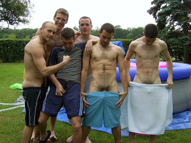 uphisshorts:  Down his shorts/towel.