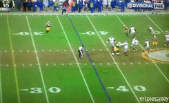 triplesalley:  January 15, 2012 - Giants vs. Packers Eli Manning throws a hail mary