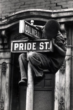 onlyoldphotography:  W. Eugene Smith: Pittsburgh (Boy Hanging on Colwell &amp; Pride St. Sign, 1955-56 