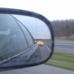 Blurry, tried so hard to get a picture of it. Yellow sciion and when it finally passed is when we turned on to my street so I couldn&rsquo;t get picture but it had black rims, it was sick! (Taken with instagram)