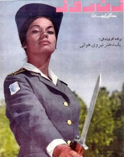 According to the comments, this is a female Iranian Air Force (or Army?) officer from the pre-Islamic Revolution era.