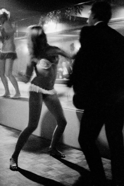 theswinginsixties:A go-go dancer dancing with a customer in Kings Cross, Sydney, Australia, 1965. Ph