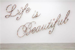 kari-shma:   Iranian artist Farhad Moshiri’s latest installation titled ‘Life is Beautiful’, was created using hundreds of knives stabbed directly into a gallery wall. The use of everyday objects, which on occasion can become lethal weapons, reveals