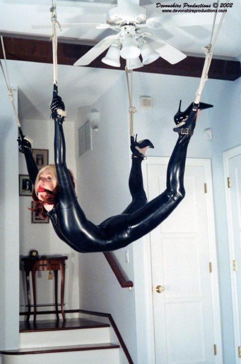 A rubber slut hanging around. adult photos