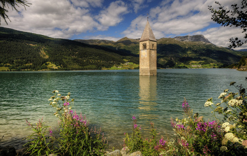 by Wolfgang Staudt on Flickr.Lago di Resia (German: Reschensee) is an artificial lake located in the