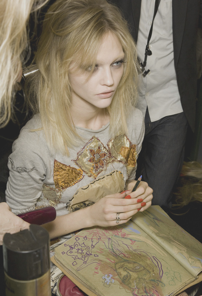 satinandtat:  Sasha Pivovarova backstage at Jean Paul Gaultier FW09 