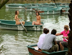 nakedgirlsdoingstuff:  Naked girls on a rowboat.