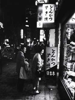 legrandcirque:  A young couple window shopping in the Ginza area. Photograph by John Dominis. Tokyo, Japan, March 1959. 