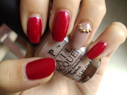 stephanieanguyen:  New Year’s Nails OPI’s Ali’s Big Break, OPI’s Tickle My France-y &amp; gold studs I liked the accent nail of my last mani so i redid it and paired it with a bright red for Tet! Happy year of the dragon =) 