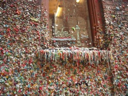 alchymista:  The Market Theater Gum Wall is in an alleyway in downtown Seattle. People waiting in line at the box office for Market Theater started sticking gum here in the 1990s, and theater workers eventually despaired of scraping it all off. Now the