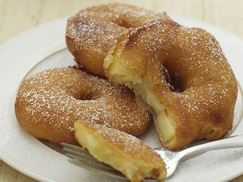 MOST POPULAR RECIPES OF 2011 ON IVILLAGE #4: Portuguese Apple Fritters
These light and aromatic doughnuts contain a slice of apple in the center of each ring for an extra tasty surprise. Get the recipe!