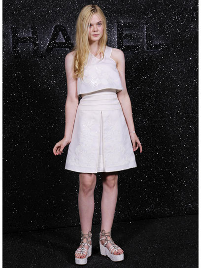 teenvogue:Style flashback: Elle Fanning looked every bit the budding fashion star in an ivory Chanel