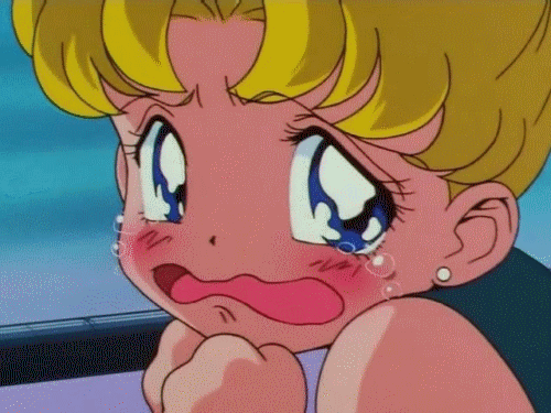 A gif of Sailor Moon, tears are streaming down her face. 