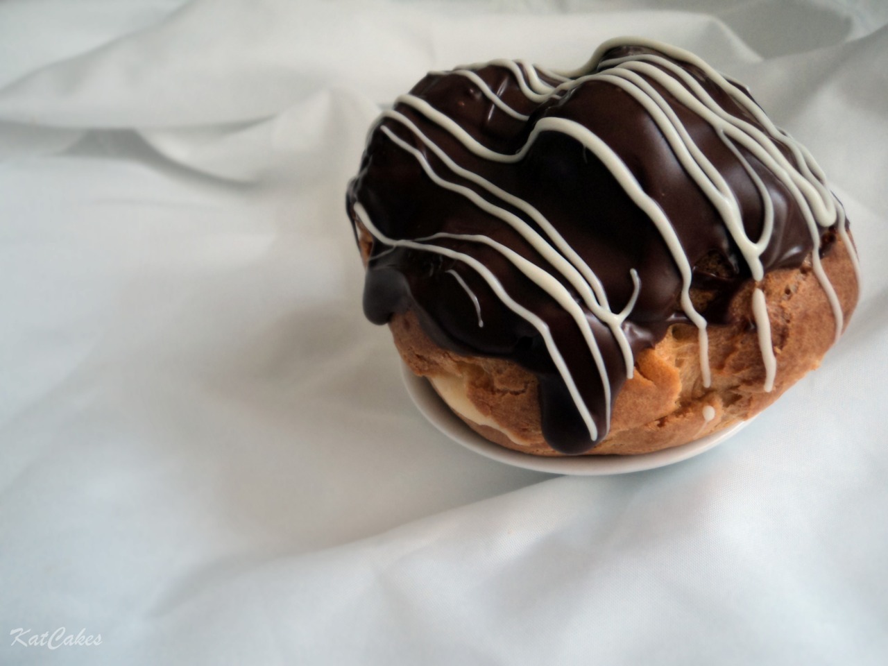 katcakes:  Giant Profiterole with Crumble Yesterday was my brother’s 12th birthday