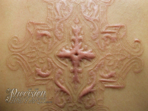 ryanpba:Detail shot of healed scarification, Ryan Ouellette