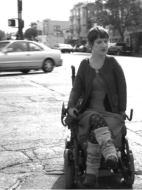 disabledpeoplearesexy:  Hi-res B&amp;W still from the video of Sunaura Taylor. She is so beautif