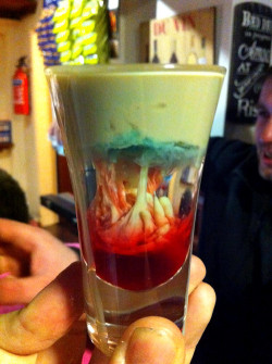 themagicaltashiclas:  archiemcphee:  Feeling thirsty? This gruesome creation is a cocktail called the Alien Brain Hemorrhage. Here’s how you make one: Fill a shot glass halfway with peach schnapps. Gently pour Bailey’s Irish Cream on top. After the