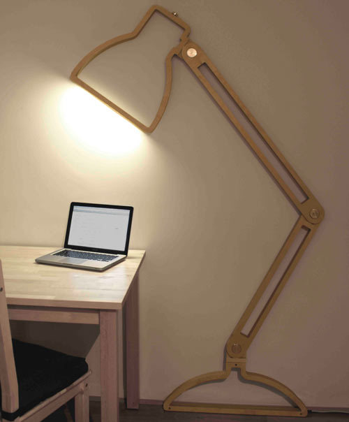 brain-food:  Lamps by Giles Godwin-Brown  The Nepa Lamp is a two-dimensional “lamp silhouette” that stands six feet. It’s wall-mounted and equipped with friction hinges to allow the piece to pivot away from the wall. Constructed of birch plywood