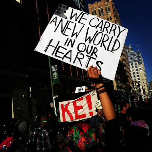 thehoopoe:  We carry a new world in our hearts - Occupy Oakland J28 move in day by Steve Rhodes on Flickr. 