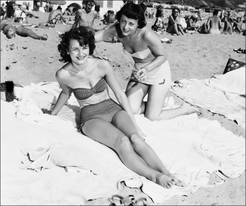 Beach scenes from assorted California beaches1950 thru 1958 Top photo: Lifeguards estimated more tha
