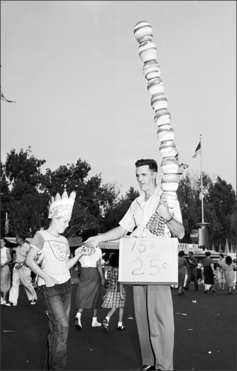 Pomona Fair, 1951Kids and adults alike enjoy the fun entertainment at the county fair. Some of the f